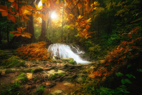 Waterfall in deep forest in autumn — Stock Photo, Image