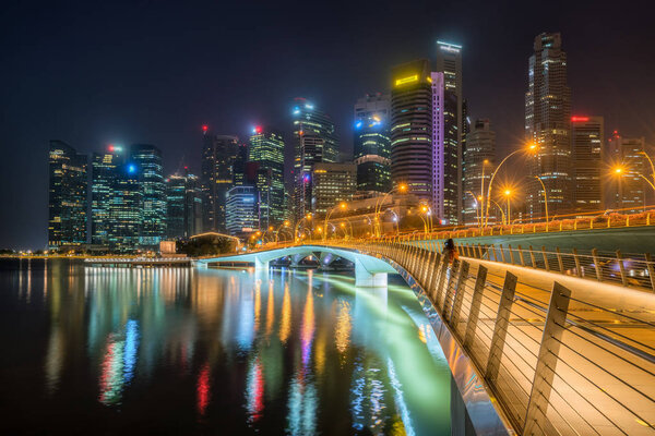 Singapore skyline at night. Singapore central business district skyline, blue sky and night skyline from marina bay. Singapore cityscape.