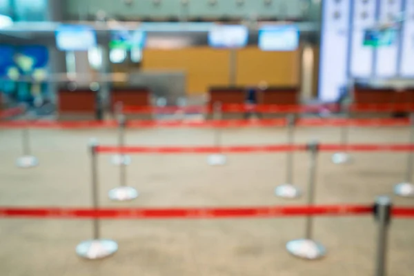 Balcão de check-in no aeroporto desfocado fundo desfocado — Fotografia de Stock