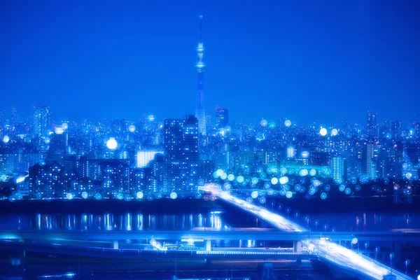 Tokyo City Sfondo notturno con luci sfocate Bokeh — Foto Stock