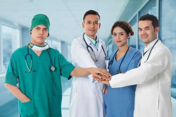 Doctors group, surgeon and nurse on hospital background — Stock Photo, Image