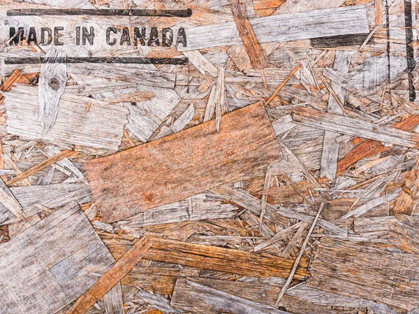Made in Canada text on recycled wood board — Stock Image Made in Canada text on recycled wood board Royalty Free Stock Photos