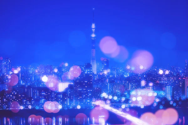 Τόκιο πόλη νύχτα φόντο με θολούρα Bokeh φώτα — Φωτογραφία Αρχείου