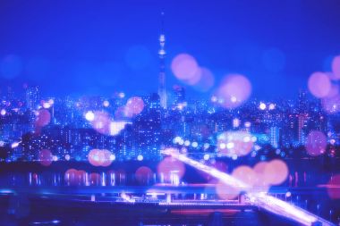 Tokyo şehir gece arka plan bulanıklık Bokeh ışıklar ile