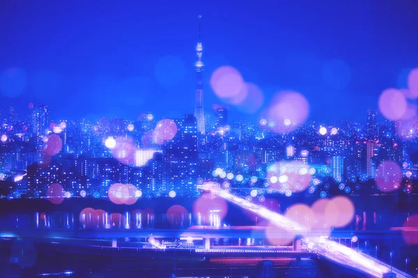 Tokyo şehir gece arka plan bulanıklık Bokeh ışıklar ile