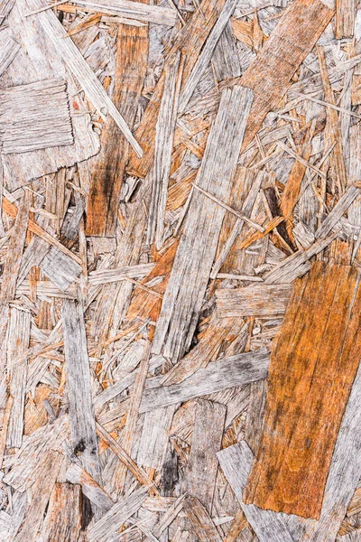 Recycled compressed wood chippings board background — Stock Image Recycled compressed wood chippings board background Stock Photo