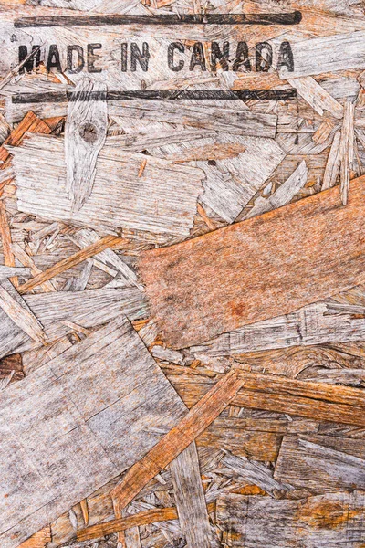 Зроблено в Канаді текст на макулатурний картон деревини — стокове фото