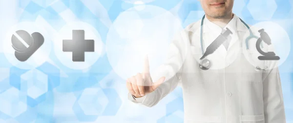 Doctor Points at Copy Space with Medical Icons — Stock Photo, Image