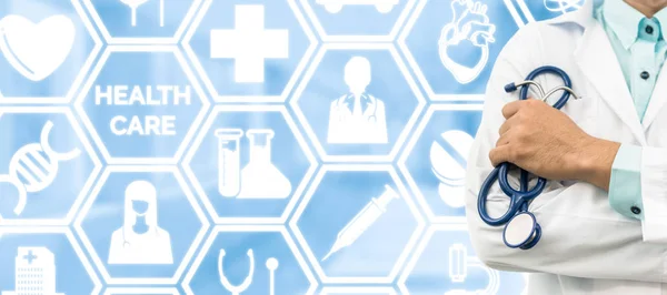 Doctor on medical icons background — Stock Photo, Image