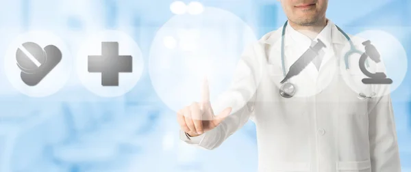 Doctor Points at Copy Space with Medical Icons — Stock Photo, Image