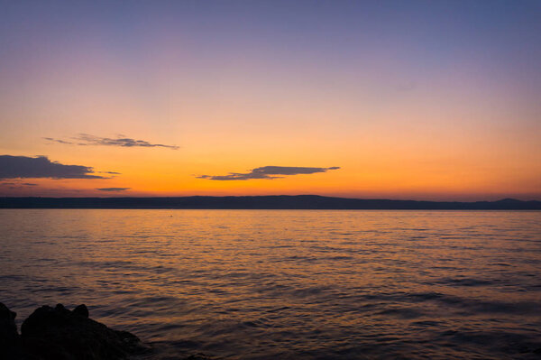 Sunset or sunrise at ocean beach landscape.