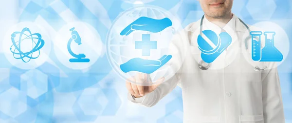 Doctor points at healthcare medical icons. — Stock Photo, Image