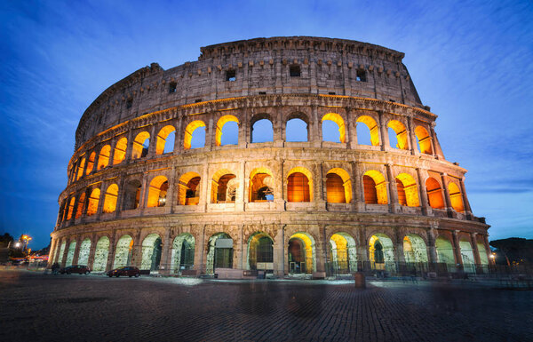 Colosseum in Rome, Italy at night. - The Rome Colosseum was built in the time of Ancient Rome in the city center. It is the main travel destination and tourist attraction of Italy.