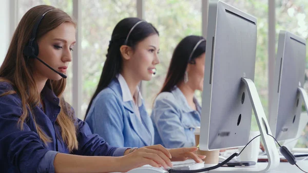 Customer Support Agent Or Call Center With Headset Works On Desktop 