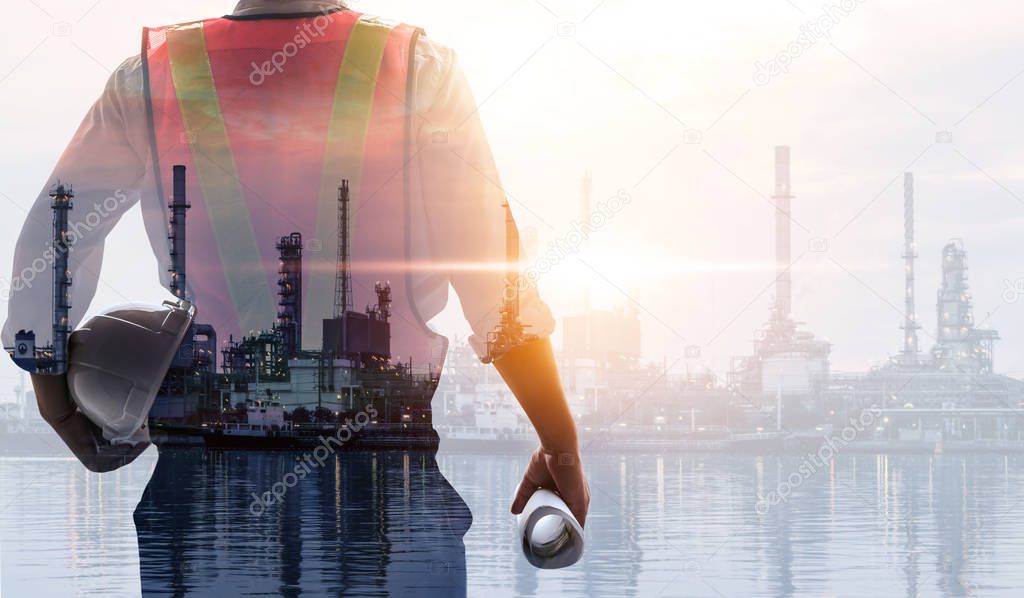 Future factory plant and energy industry concept in creative graphic design. Oil, gas and petrochemical refinery factory with double exposure arts showing next generation of power and energy business.