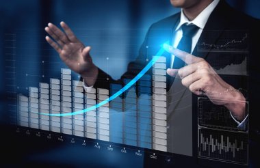 İş ve Finans 'ın Çifte Maruz Kalıbı - Raporu olan İşadamı, borsa yatırımlarının mali kar artışına doğru ilerledi.