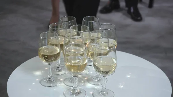 Successful business people drink wine and champagne with team members in ball room to celebrate business project to launch new product to market. Corporate business and people networking concept.;Successful business people drink wine and champagne wi
