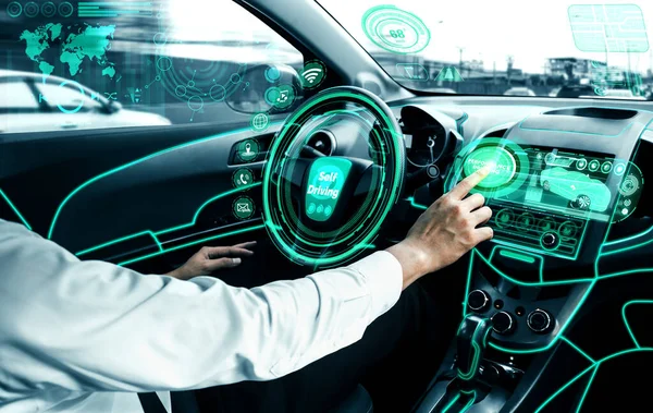 Self-driving autonomous car with relaxed young man sitting at driver seat is driving on busy highway road in the city. Concept of machine learning, artificial intelligence and augmented reality.