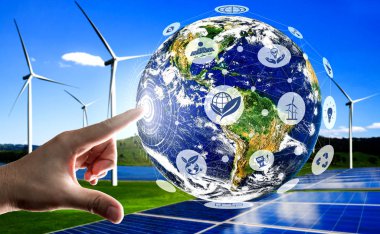 Alternatif enerji ile sürdürülebilirlik gelişimi kavramı. Çevre dostu rüzgar türbini çiftliği ve arka planda yeşil yenilenebilir enerji ile insan eliyle dünya ile ilgilenin..