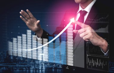 İş ve Finans 'ın Çifte Maruz Kalıbı - Raporu olan İşadamı, borsa yatırımlarının mali kar artışına doğru ilerledi.