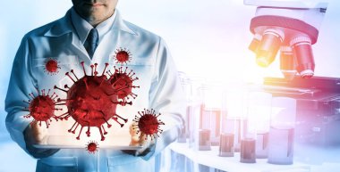 Coronavirus COVID 19 tıbbi test aşısı araştırma ve geliştirme konsepti. COVID-19 için ilaç tedavisi üretmek üzere Coronavirus antikor bilimsel örneklerini inceleyen ve analiz eden bilim insanları.