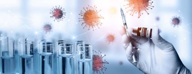 Coronavirus COVID 19 tıbbi test aşısı araştırma ve geliştirme konsepti. COVID-19 için ilaç tedavisi üretmek üzere Coronavirus antikor bilimsel örneklerini inceleyen ve analiz eden bilim insanları.