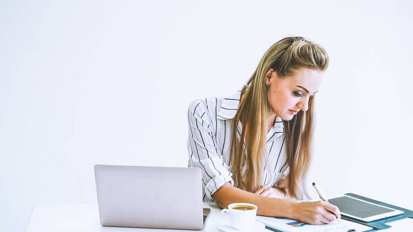 Blonde business woman working at modern office. Business concept.