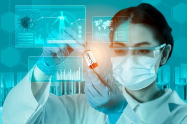 Coronavirus COVID 19 tıbbi test aşısı araştırma ve geliştirme konsepti. COVID-19 için ilaç tedavisi üretmek üzere Coronavirus antikor bilimsel örneklerini inceleyen ve analiz eden bilim insanları.