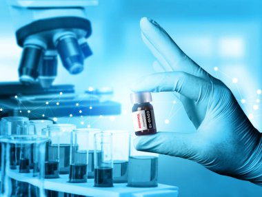 Coronavirus COVID 19 tıbbi test aşısı araştırma ve geliştirme konsepti. COVID-19 için ilaç tedavisi üretmek üzere Coronavirus antikor bilimsel örneklerini inceleyen ve analiz eden bilim insanları.