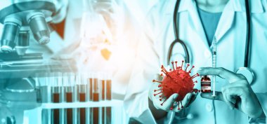 Coronavirus COVID 19 tıbbi test aşısı araştırma ve geliştirme konsepti. COVID-19 için ilaç tedavisi üretmek üzere Coronavirus antikor bilimsel örneklerini inceleyen ve analiz eden bilim insanları.