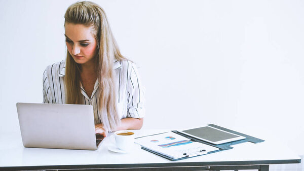 Blonde business woman working at modern office. Business concept.