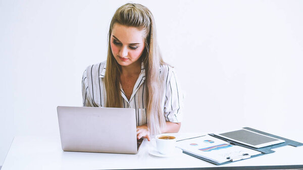 Blonde business woman working at modern office. Business concept.